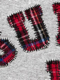 Supreme Plaid Arc appliqué sweater
